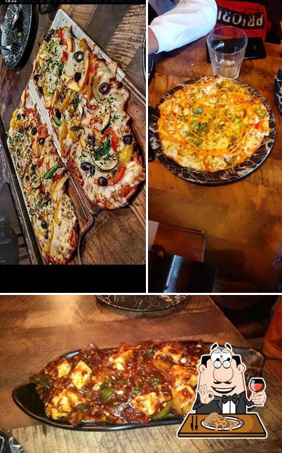 Get pizza at Bombay Eatery