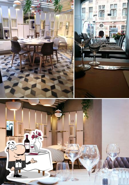 Jetez un coup d’oeil à la photo représentant la table à manger et intérieur concernant Osteria Michele Leuven