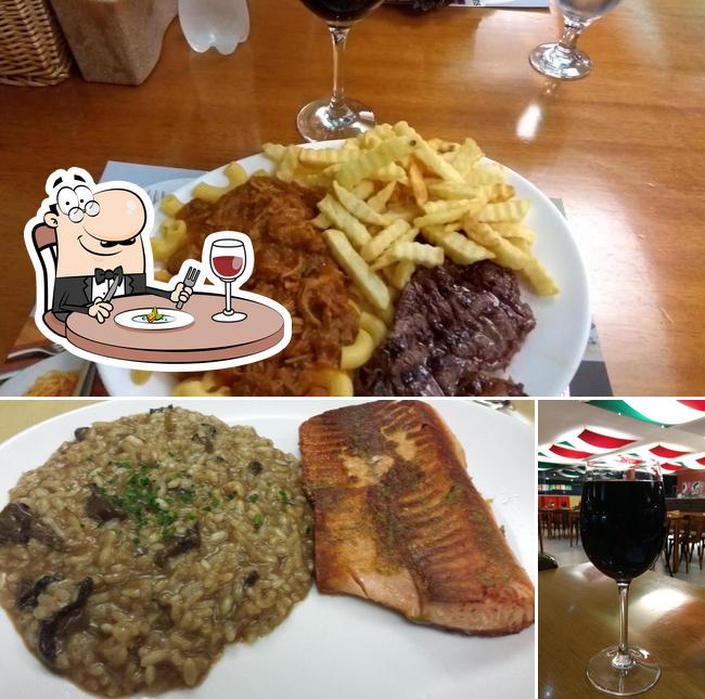 Check out the picture showing food and alcohol at Canta Maria Expresso