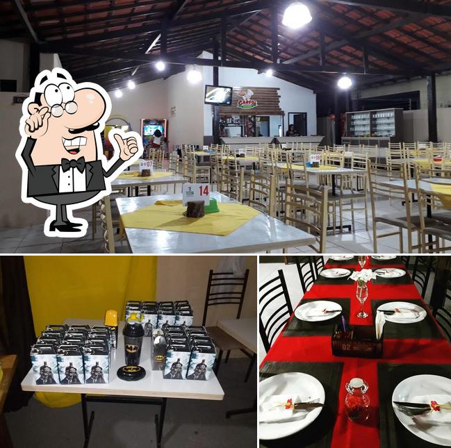 O interior do Mana's Restaurante e Pizzaria