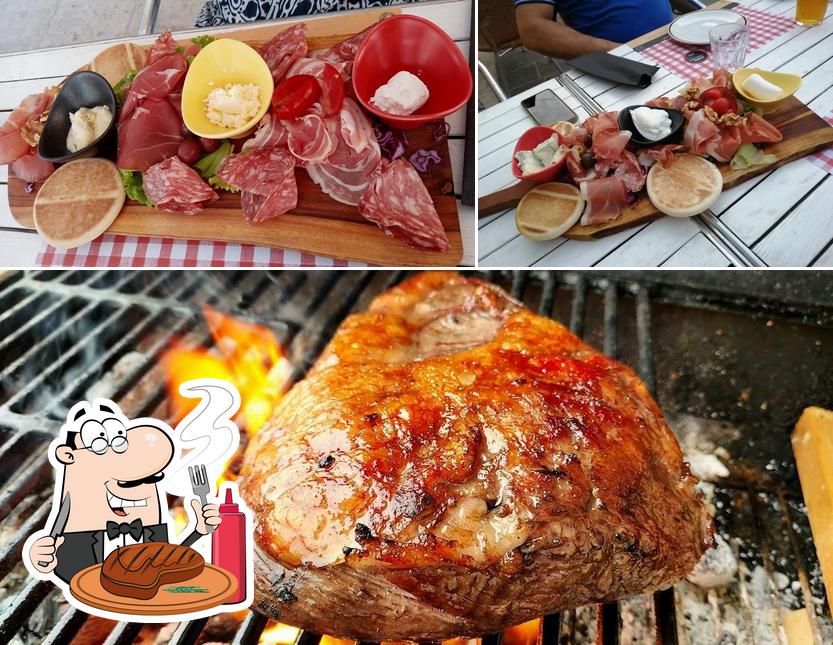 Scegli i piatti di carne a Osteria la Cantina