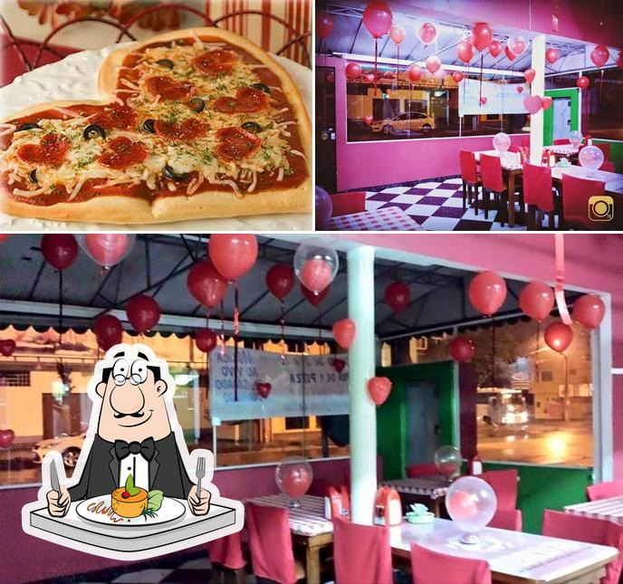 Снимок, на котором видны еда и внутреннее оформление в Pizzaria Casa Nova