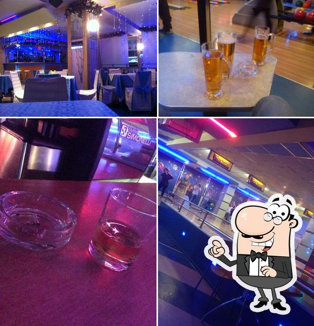 Las fotos de interior y bebida en Кафе Сирень