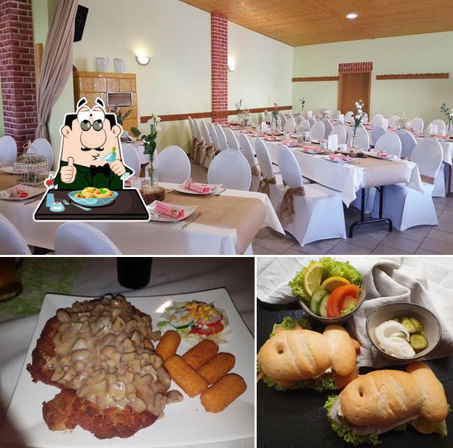 Mira las fotos donde puedes ver comida y interior en Dorfkrug - Wallmow