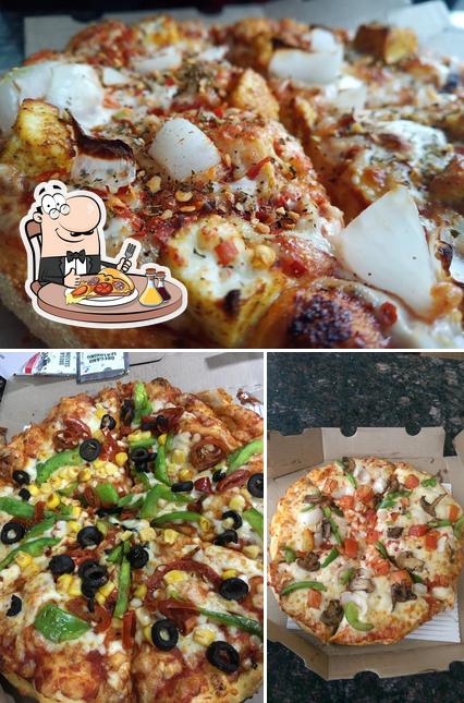 Try out pizza at Domino's pizza