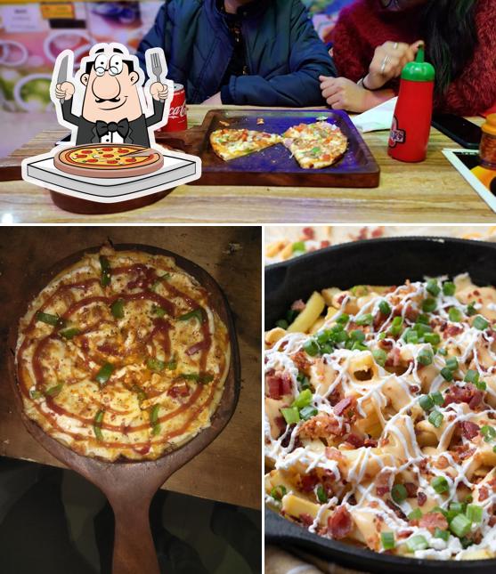 Order pizza at Too Much Cafe Restaurant And Disco