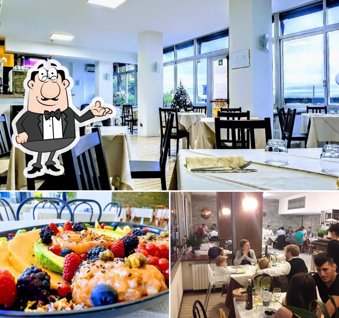 Siediti a un tavolo di Ristorante Pizzeria Bluebird