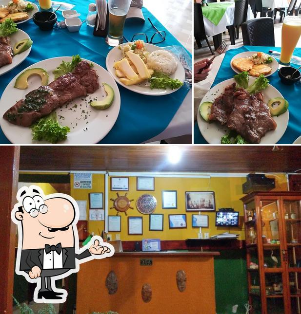 Check out the photo displaying interior and food at Restaurante Camino Real