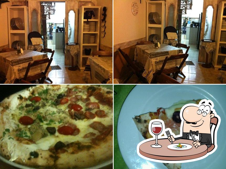 Esta é a foto apresentando comida e interior a Portalba Pizzaria