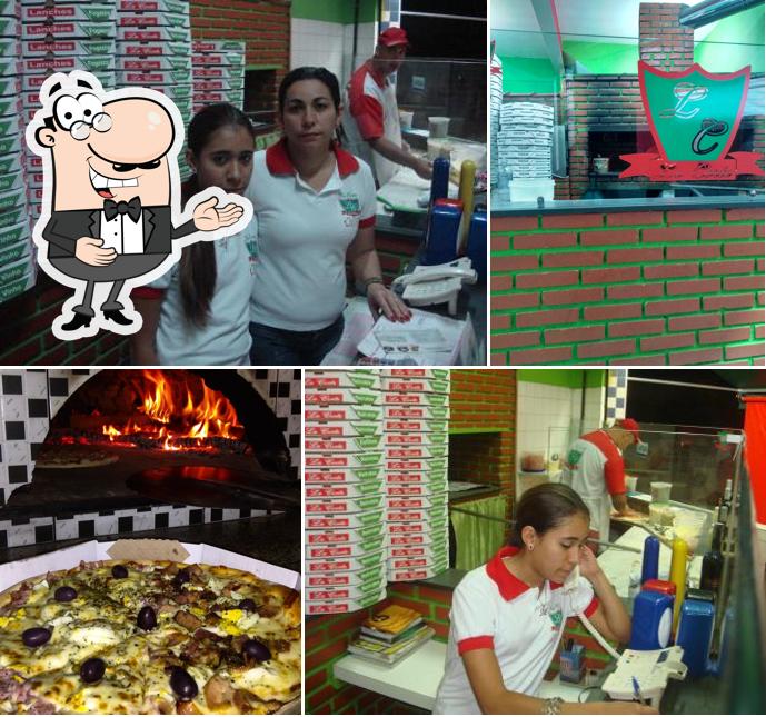 Look at the photo of Pizzaria La Corte