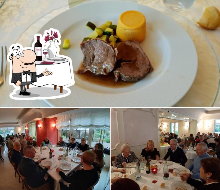 Guarda la immagine che presenta la tavolo da pranzo e cibo di Ristorante Villa Letizia