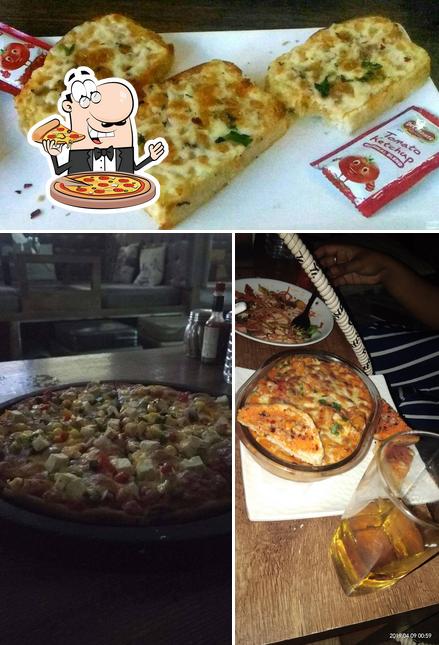 Try out pizza at OMG CAFE