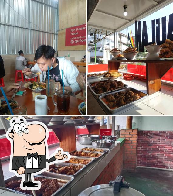 Take a look at the photo showing interior and food at Rumah Makan Padang Pergaulan