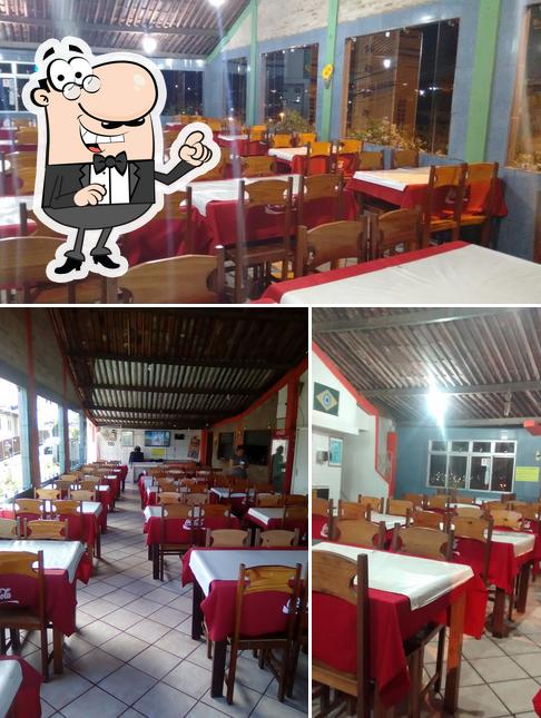 O interior do Pizzaria Forno Quente