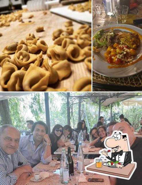 La immagine della cibo e tavolo da pranzo di Ca Nova Del Tenente