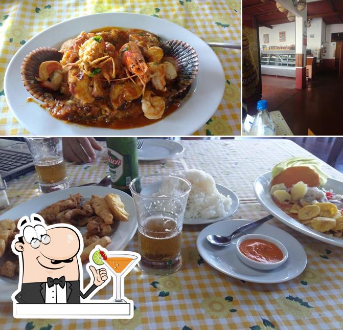 Take a look at the photo displaying drink and food at Restaurante Marcelo