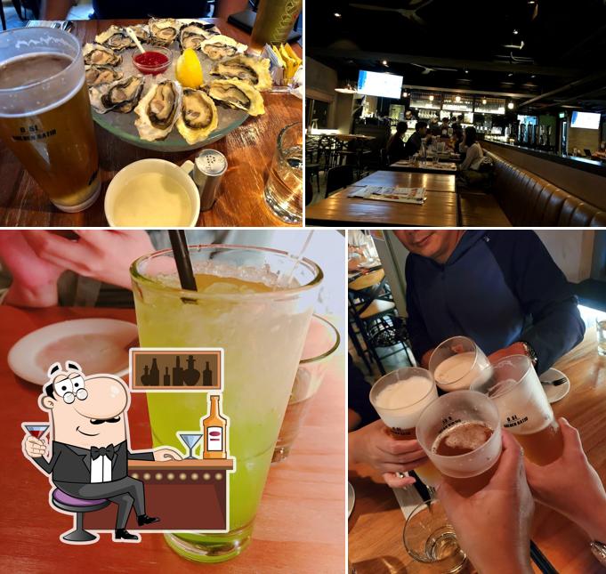 The photo of Oyster Station’s bar counter and drink