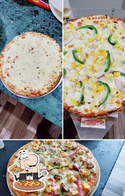 Try out pizza at Emperor's Cafe