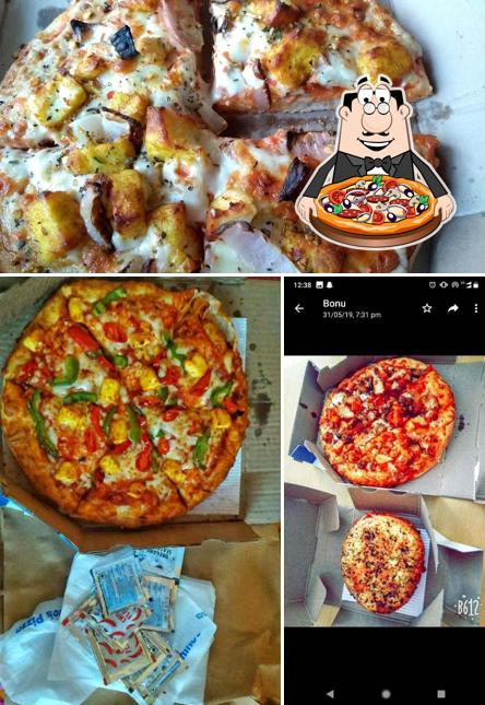 Try out pizza at Domino's Pizza