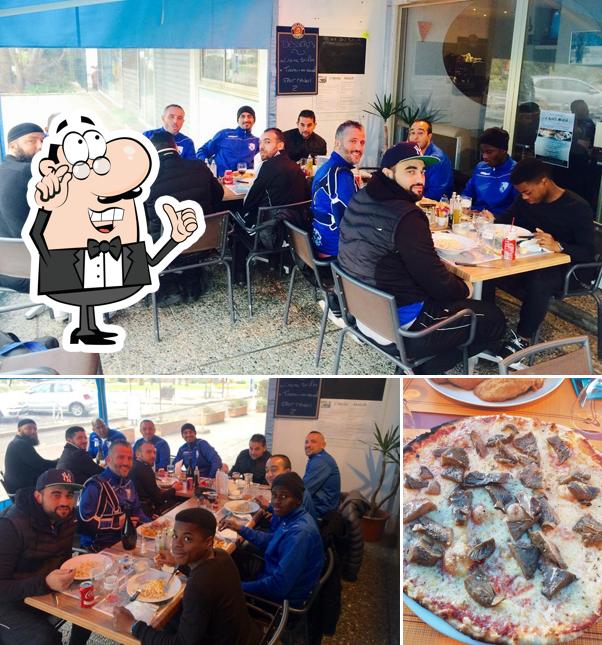 La photo de la intérieur et pizza concernant L'Après Match