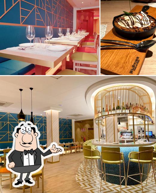 Take a look at the image showing interior and dessert at PLÁTICA Restaurante
