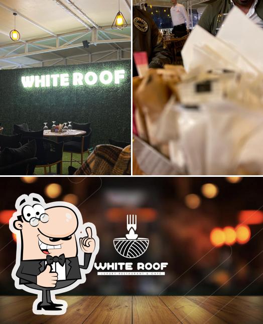 Look at the picture of White Roof Restaurant مطعم وايت روف