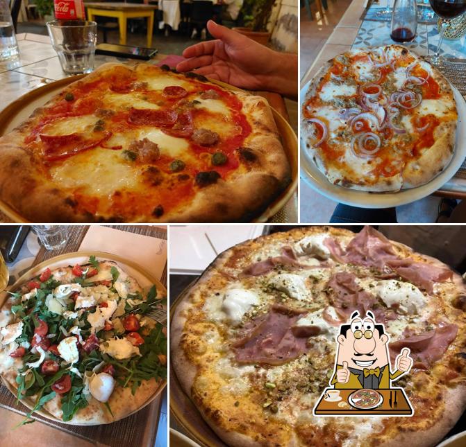 A L’artigiano Trattoria pizzeria, puoi assaggiare una bella pizza