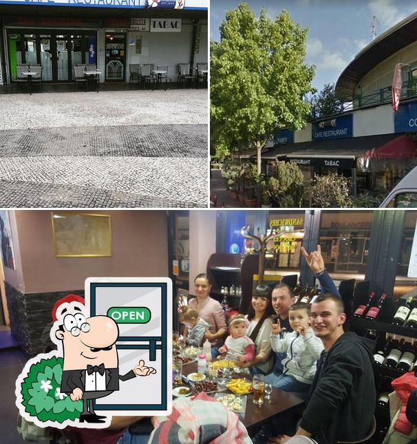 La extérieur et table à manger du restaurant