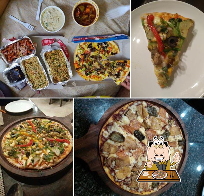 Get pizza at Hotel The Orion Jaipur