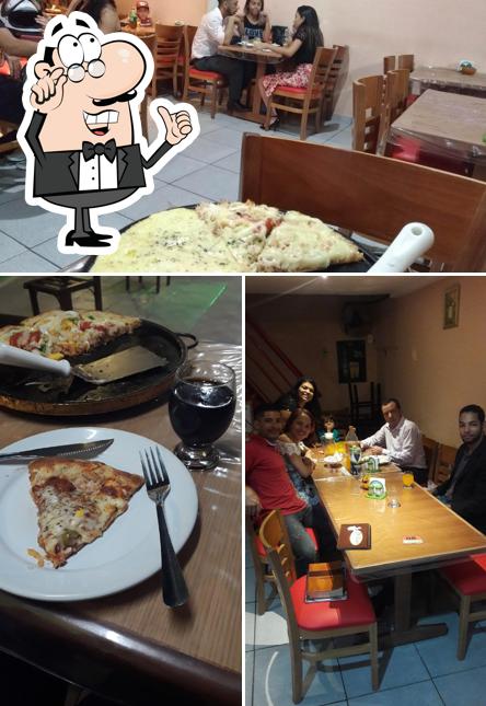 O interior do Pizzaria Cristina