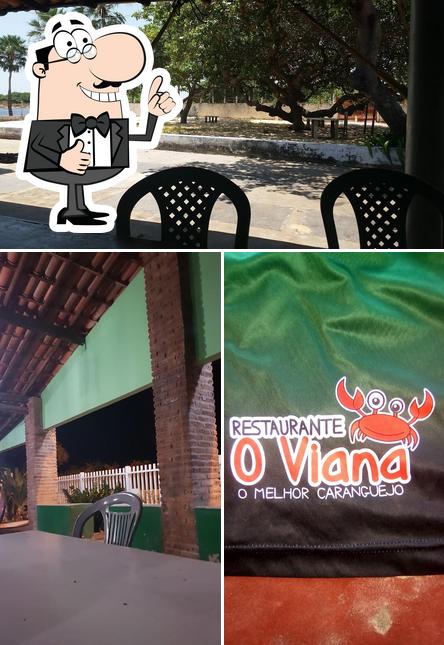 Look at the photo of Restaurante o viana