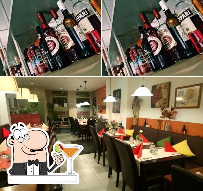 Pizzeria Restaurant Gallas is distinguished by drink and dining table