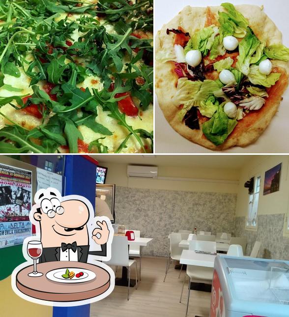 Dai un’occhiata alla foto che mostra la cibo e interni di Pizzeria L'Angolo Della Pizza