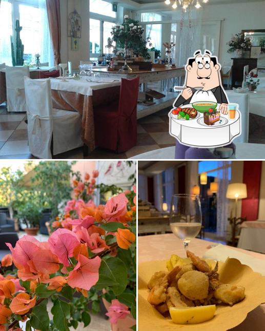 La foto della tavolo da pranzo e cibo di Belvedere ai Colli