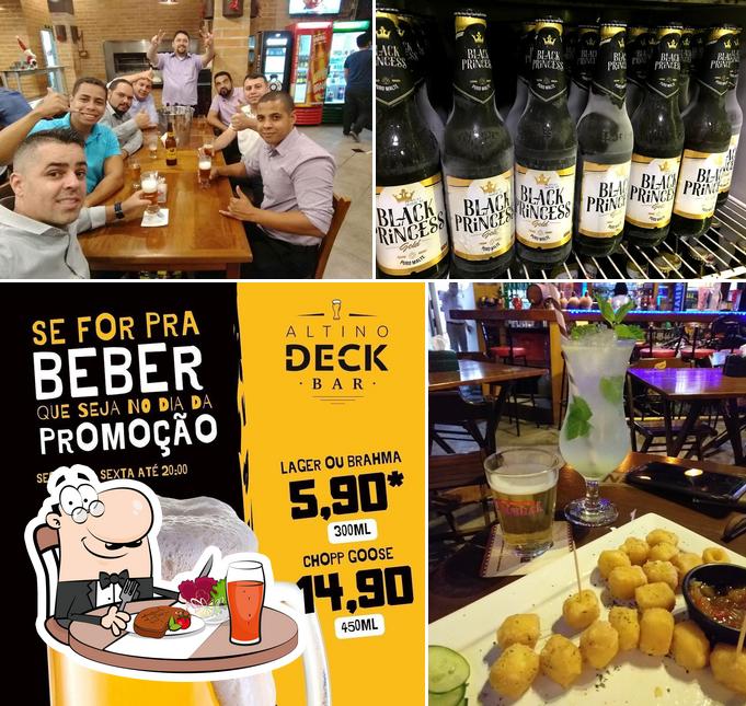 Esta é a imagem apresentando mesa de jantar e bebida no Altino Deck Restaurante e Bar