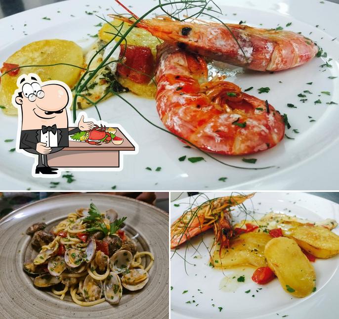 Prenez des fruits de mer à La Nuova Costa Ristorante Pizzeria