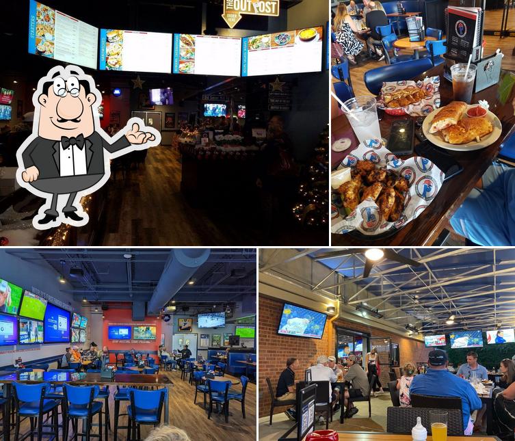 Take a seat at one of the tables at The Post Sports Bar & Grill - Fenton