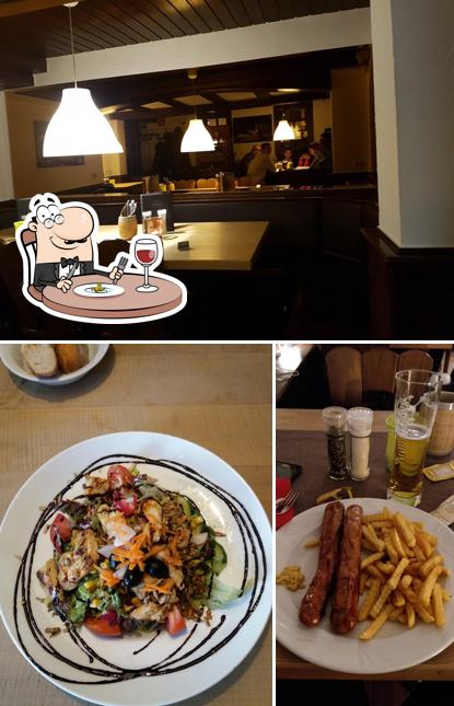 The photo of food and interior at Altes Brauhaus