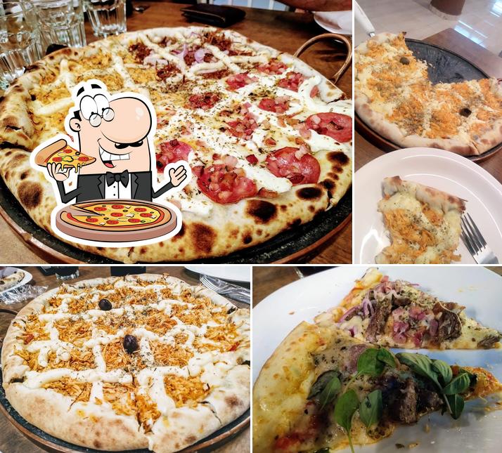 Try out pizza at Cantina Jardim