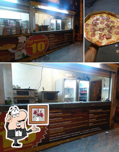 Entre diversos coisas, interior e pizza podem ser encontrados no PIZZA MAANAIM