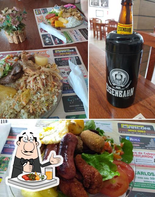 A foto da comida e cerveja no Restaurante do Gaúcho