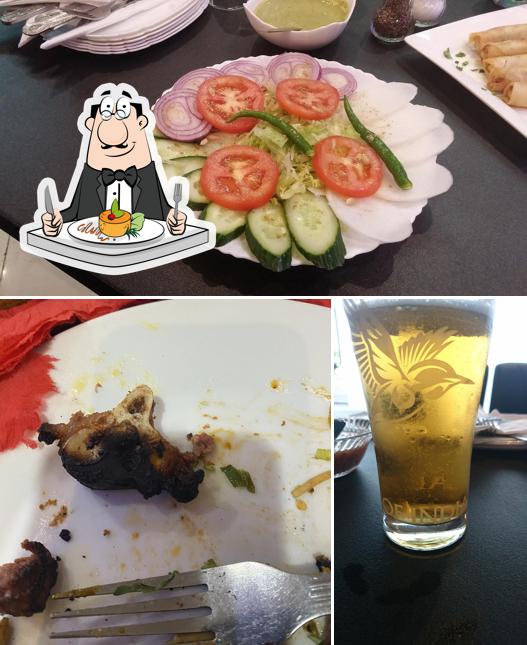 Take a look at the photo showing food and beer at King Karahi