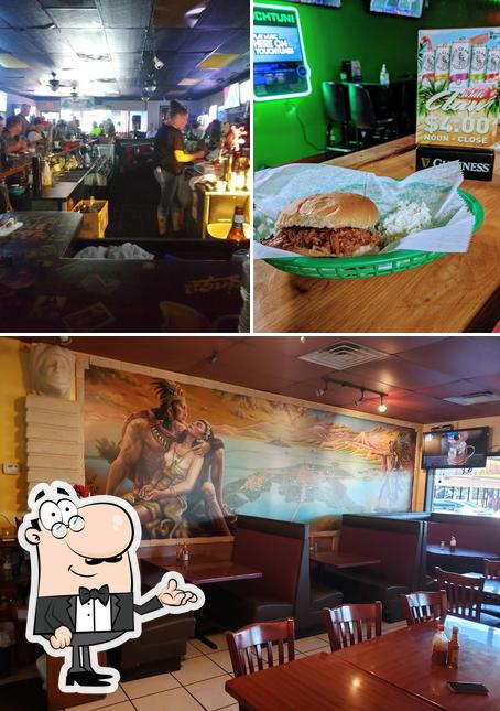 Take a look at the picture displaying interior and food at Shenanigans Irish Pub