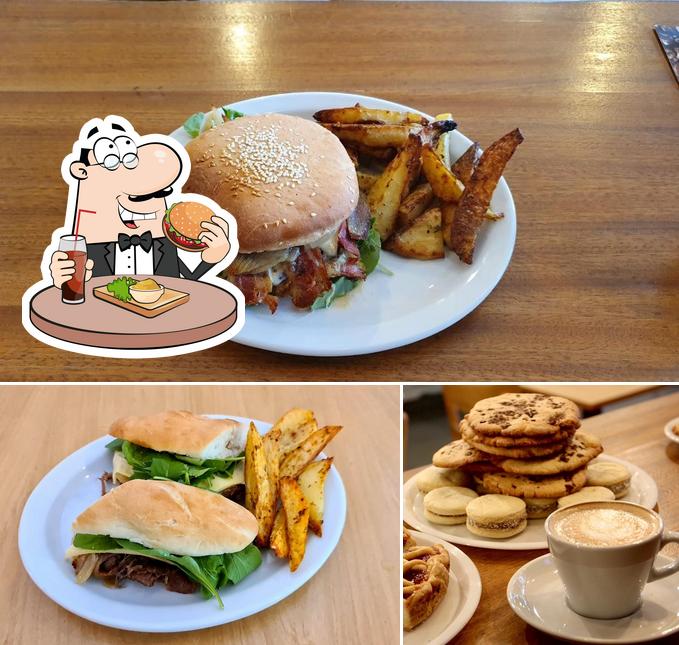 Order a burger at CULTURA CAFE