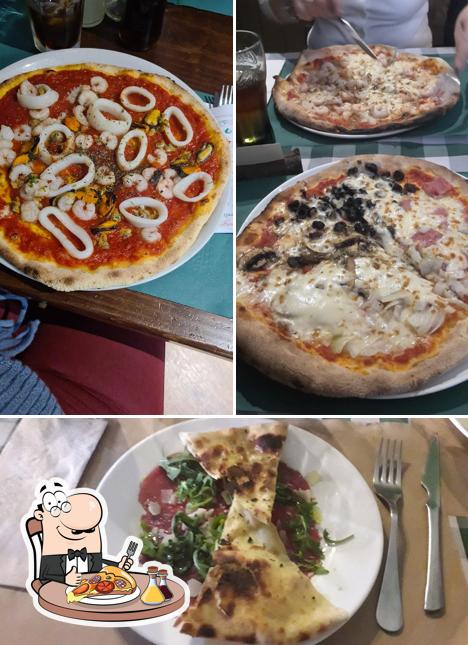 Попробуйте пиццу в "Pizzería La Giara"