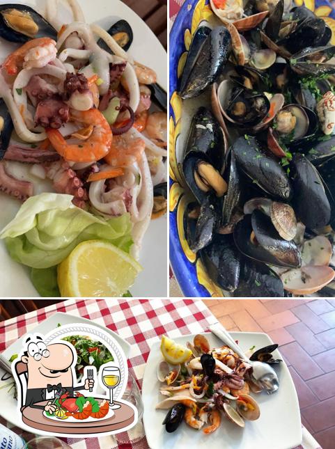 Закажите блюда с морепродуктами в "Ristorante La Sosta"