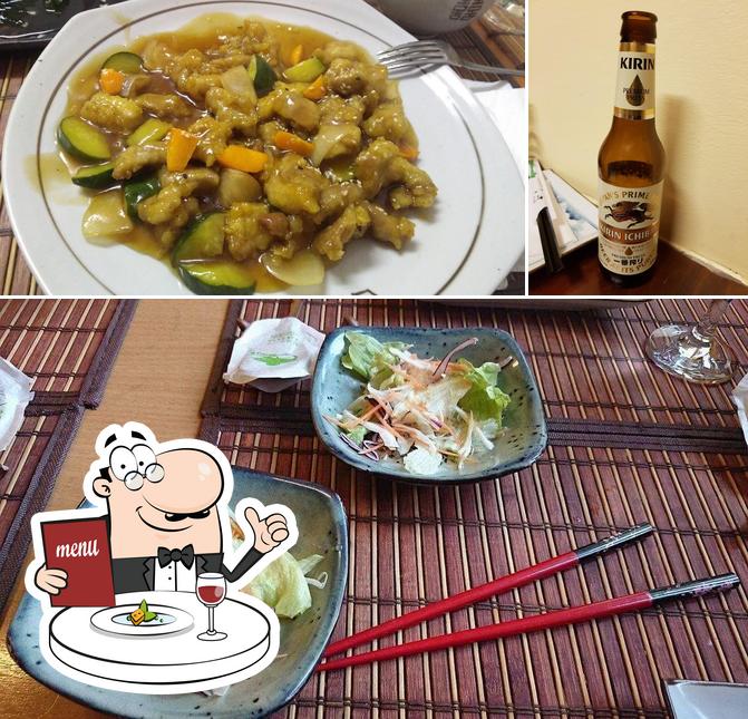 Take a look at the picture showing food and beer at Arirang - Sushi Grand