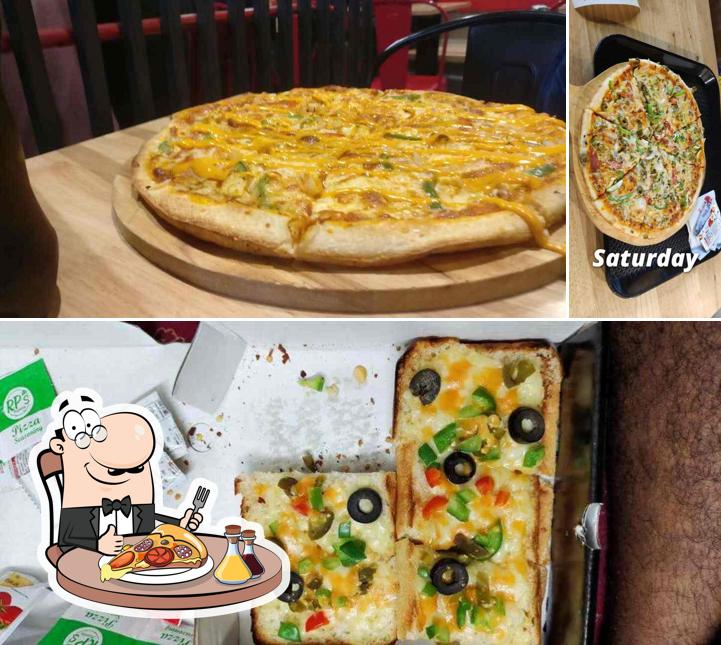 Pick pizza at RP's Pizzeria Gandhinagar