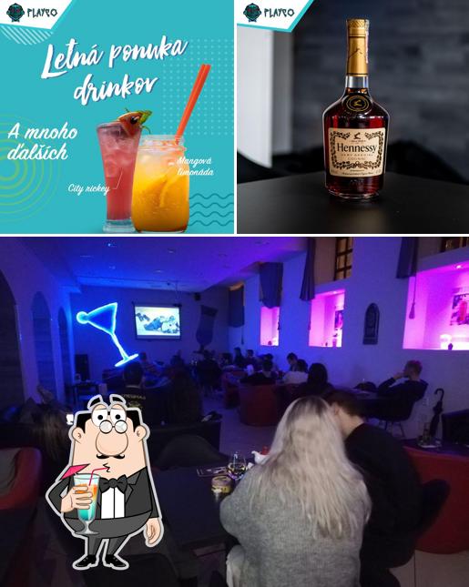 Take a look at the photo displaying drink and interior at Playco - Cocktails and Games
