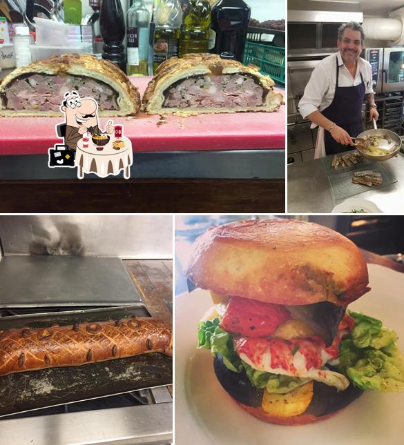Сэндвич с рваной свининой, паэлья и гамбургер в "Chez Rosa Restaurant"